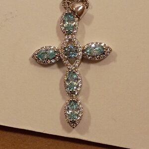 Elegant Silver and Blue Gemstone Cross Necklace